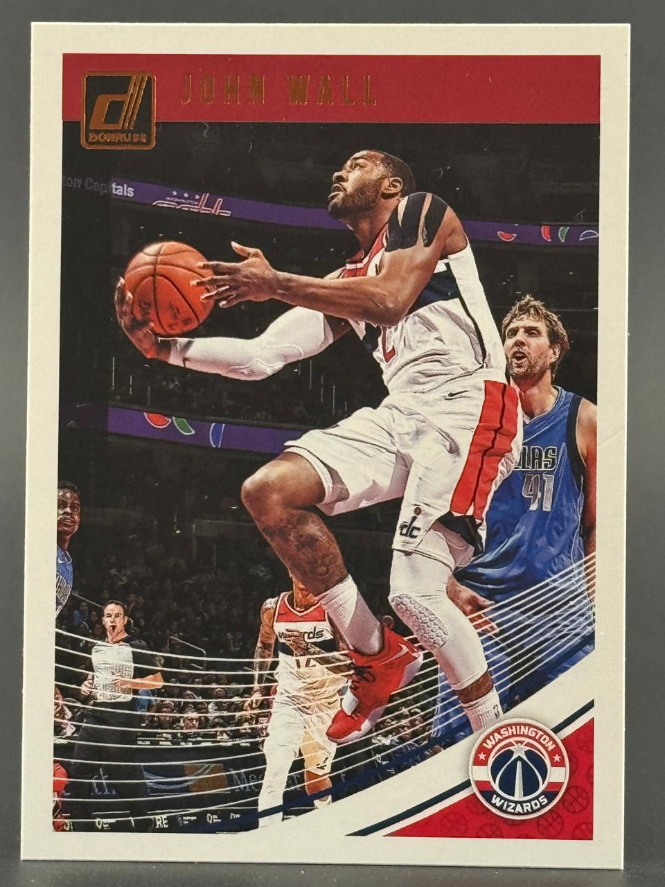 John Wall Donruss basketball card with player in mid-air holding a basketball.