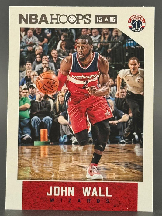 2015-16 NBA Hoops John Wall trading card featuring John Wall dribbling in a game.