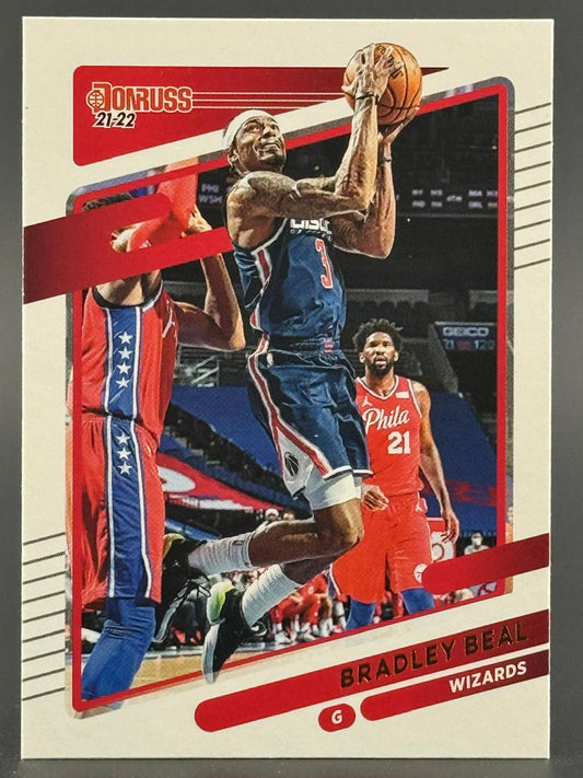 2021-22 Donruss Bradley Beal basketball card featuring Beal in a Wizards uniform shooting a jump shot.