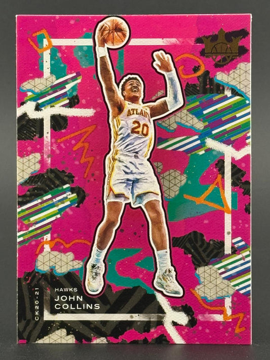 John Collins Atlanta Hawks basketball card with vibrant pink and abstract background art.