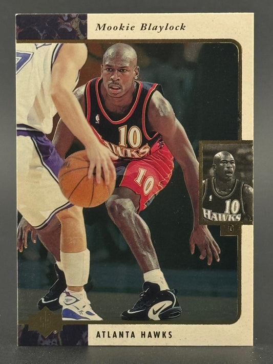 Mookie Blaylock basketball card featuring him dribbling in his Atlanta Hawks uniform.