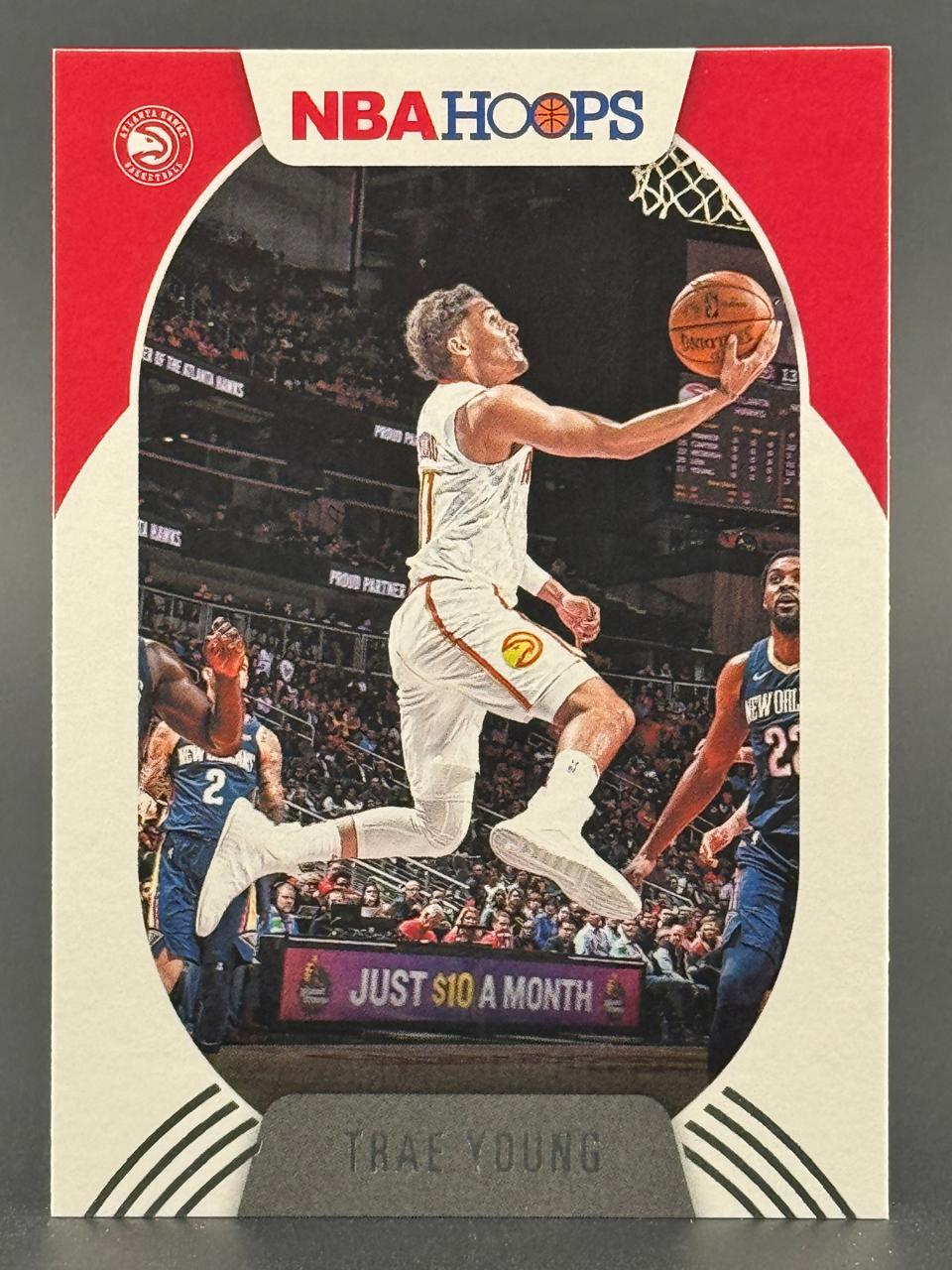 Trae Young 2021-22 NBA Hoops basketball card.