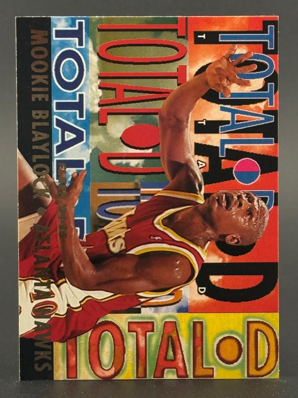 Mookie Blaylock Atlanta Hawks trading card with colorful abstract background and "TOTAL D" text.