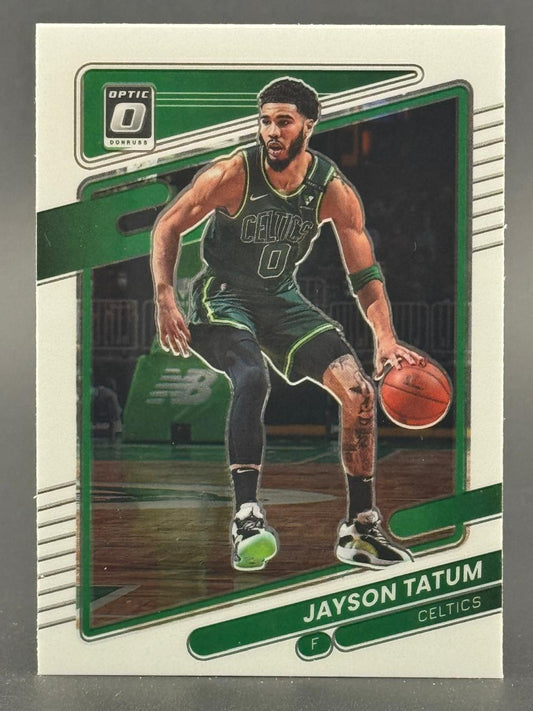 Donruss Optic Jayson Tatum basketball card showing him dribbling in a Celtics uniform.