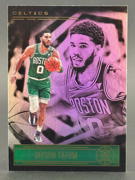 Jayson Tatum basketball card showing him dribbling in a Celtics uniform with a purple background graphic.