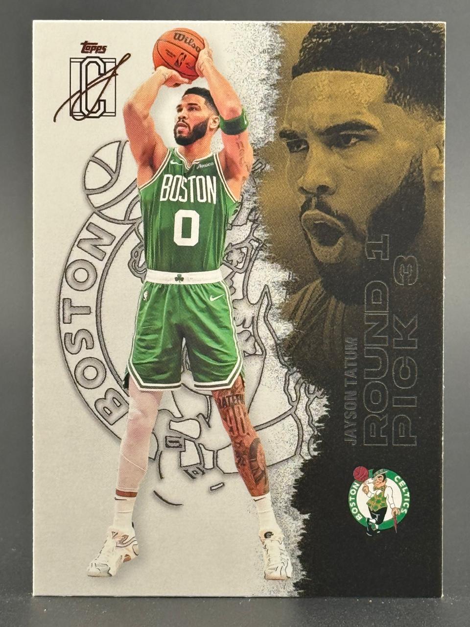 Jayson Tatum basketball trading card featuring him in a green Boston Celtics uniform shooting a basketball.