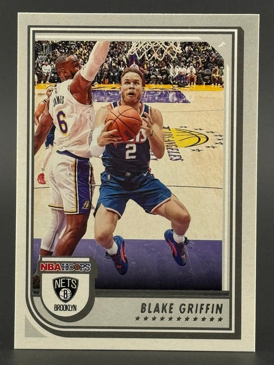 Blake Griffin NBA Hoops basketball card, featuring him defending LeBron James.