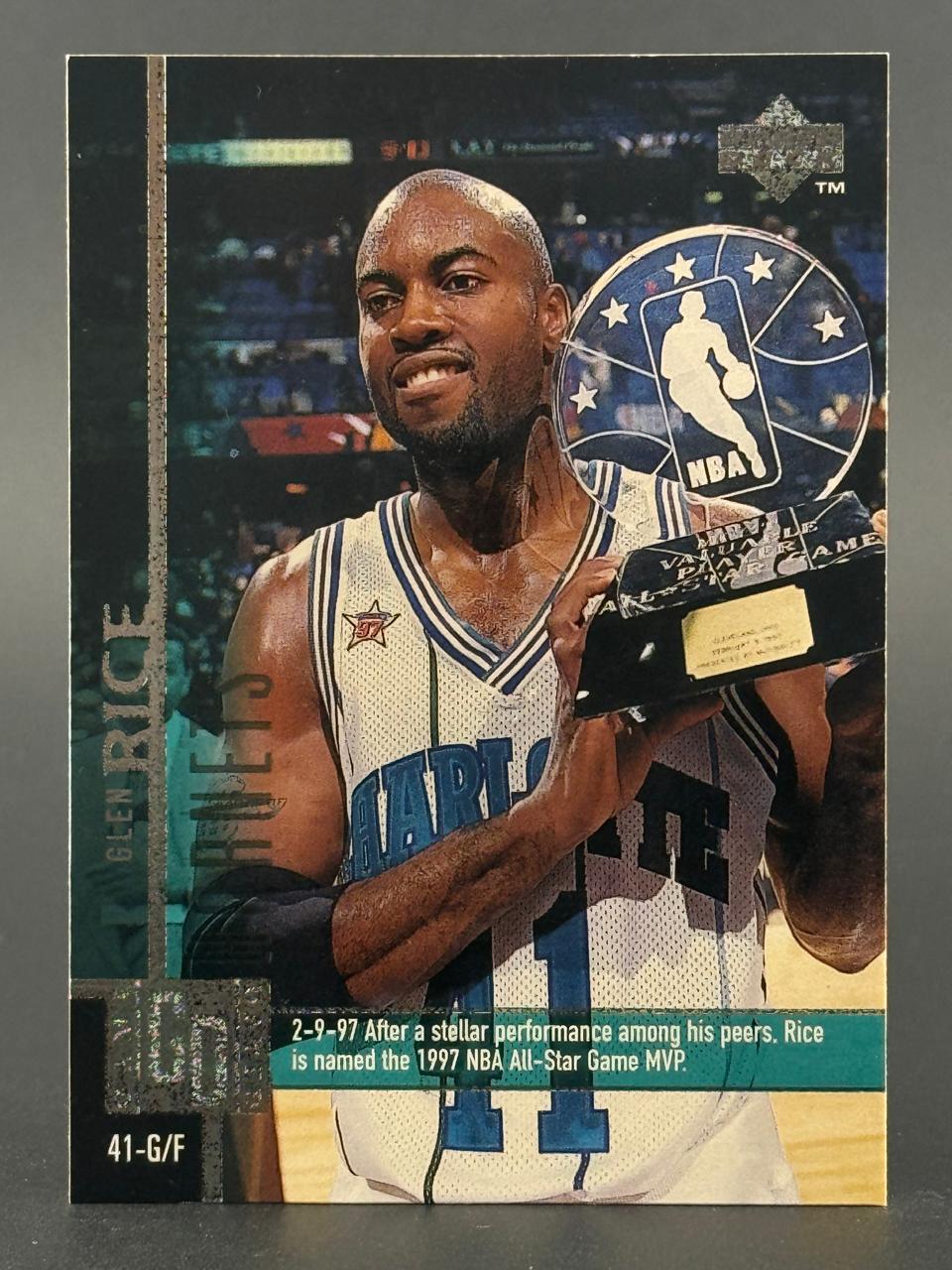 Trading card of Glen Rice holding a 1997 NBA All-Star Game MVP trophy, card number 41.