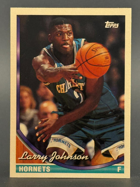 1992-93 Topps Larry Johnson trading card #193, depicting him passing a basketball in a Hornets uniform.