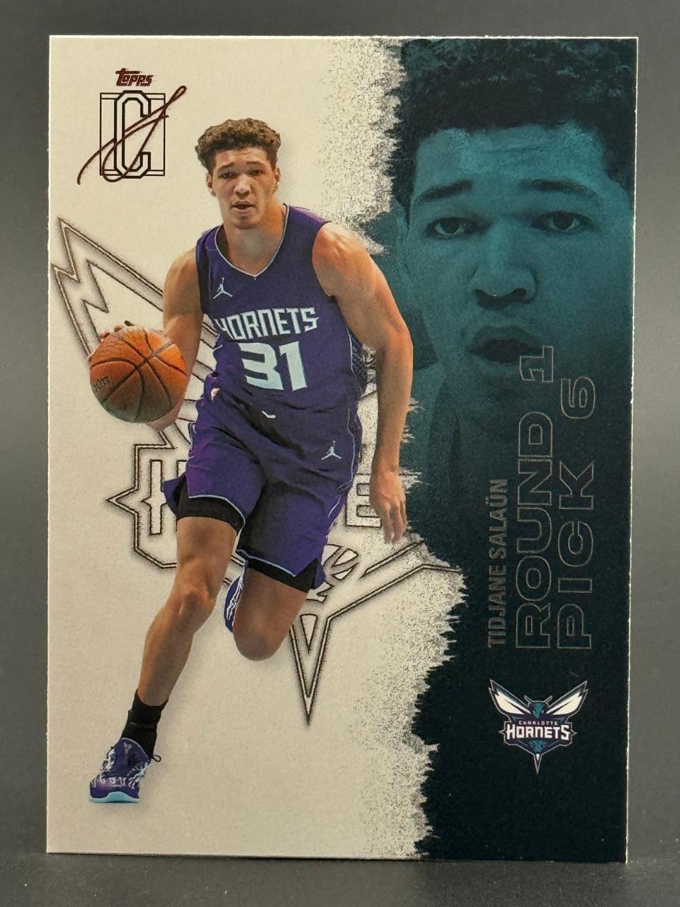 Tidjane Salaün Topps trading card, depicting him in a Hornets uniform dribbling a basketball.