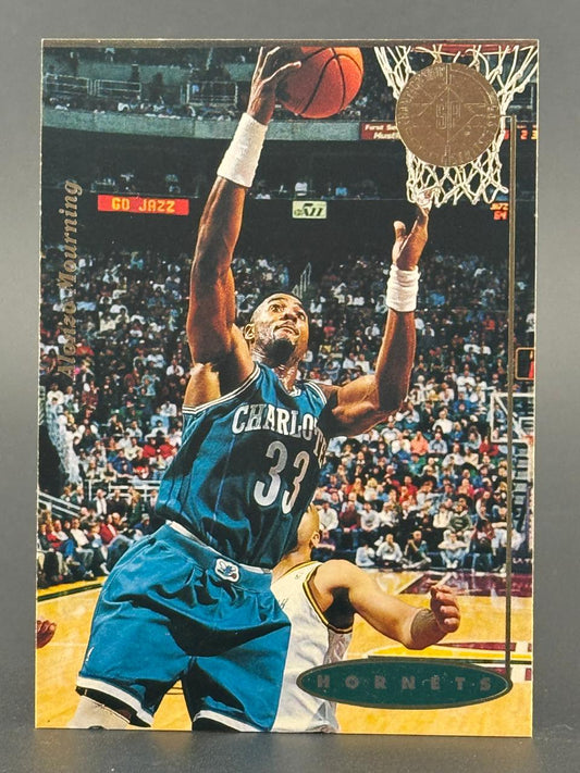 1993 Upper Deck SP Alonzo Mourning basketball card showing him shooting a layup.