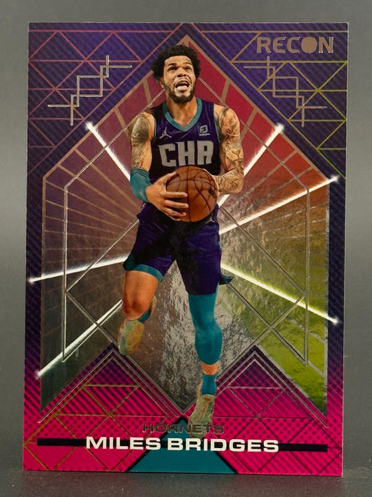 Miles Bridges 2021-22 Panini Recon basketball card holding a ball.