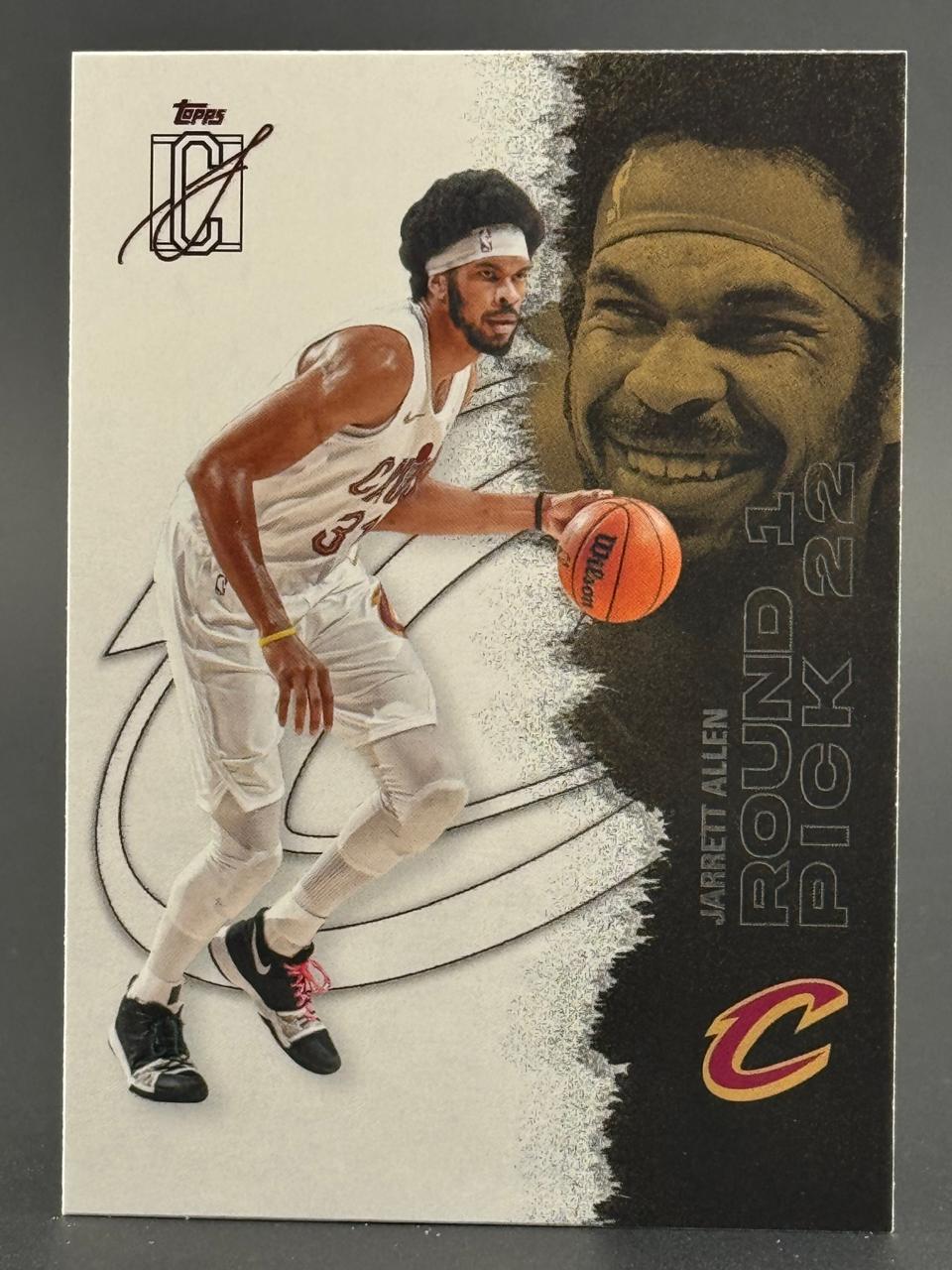 Jarrett Allen Topps trading card, showing him dribbling in a Cavaliers uniform.