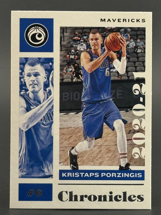 2020-21 Panini Chronicles Kristaps Porzingis Mavericks card #6, showing him holding a basketball.