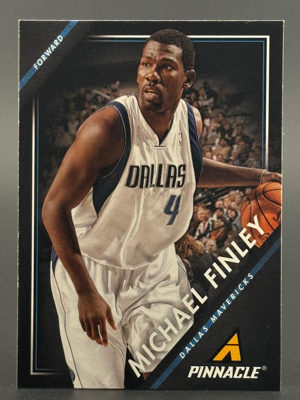 Michael Finley basketball card, Pinnacle brand, showing him in a Dallas Mavericks uniform dribbling a ball.