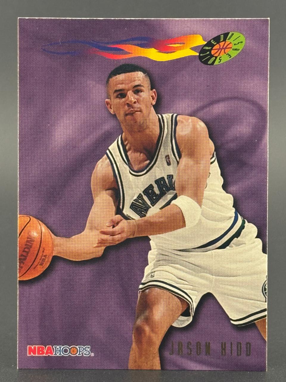 Jason Kidd 1994 NBA Hoops trading card, #2, passing a basketball against a purple background.