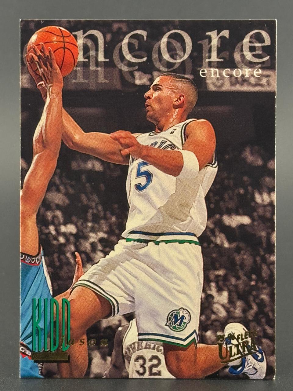 1995-96 Fleer Ultra Jason Kidd trading card featuring Kidd in a Mavericks uniform holding a basketball.