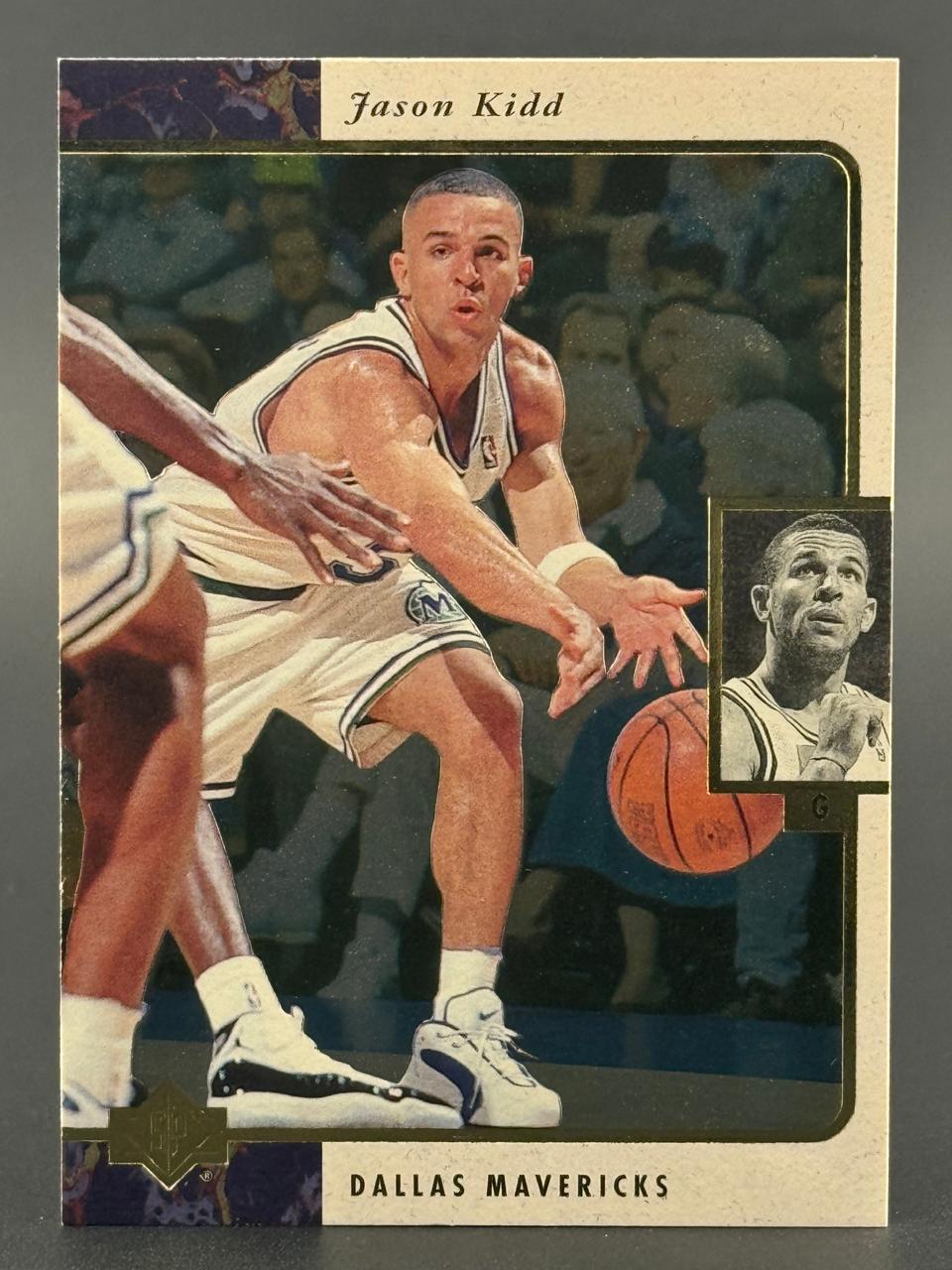 1994 Upper Deck Jason Kidd Dallas Mavericks rookie basketball card dribbling the ball.