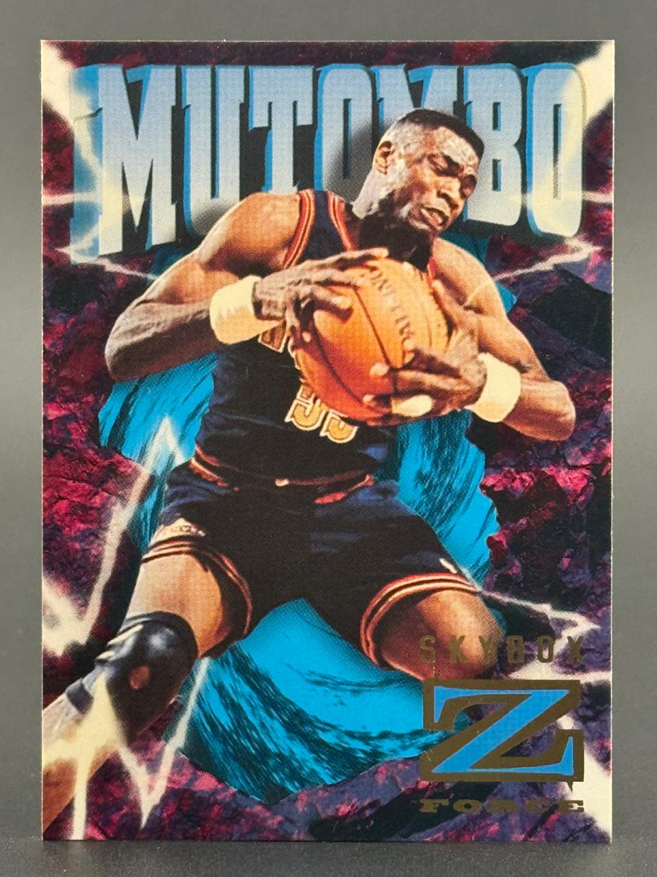 1996-97 SkyBox Z-Force Dikembe Mutombo basketball trading card.