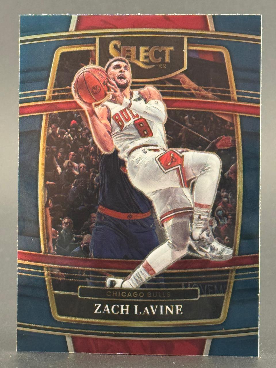 2022 Select Zach LaVine basketball card, showing him in a Chicago Bulls uniform holding a basketball.