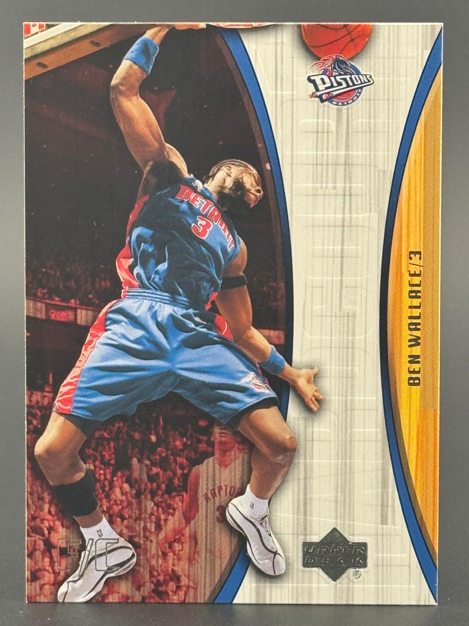 Ben Wallace 3 trading card featuring him dunking in a Pistons uniform.