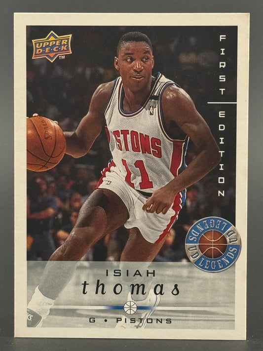 Isiah Thomas 1997 Upper Deck First Edition basketball card dribbling in a Pistons uniform.