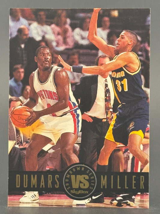 Joe Dumars and Reggie Miller on a 1990s SkyBox basketball trading card.