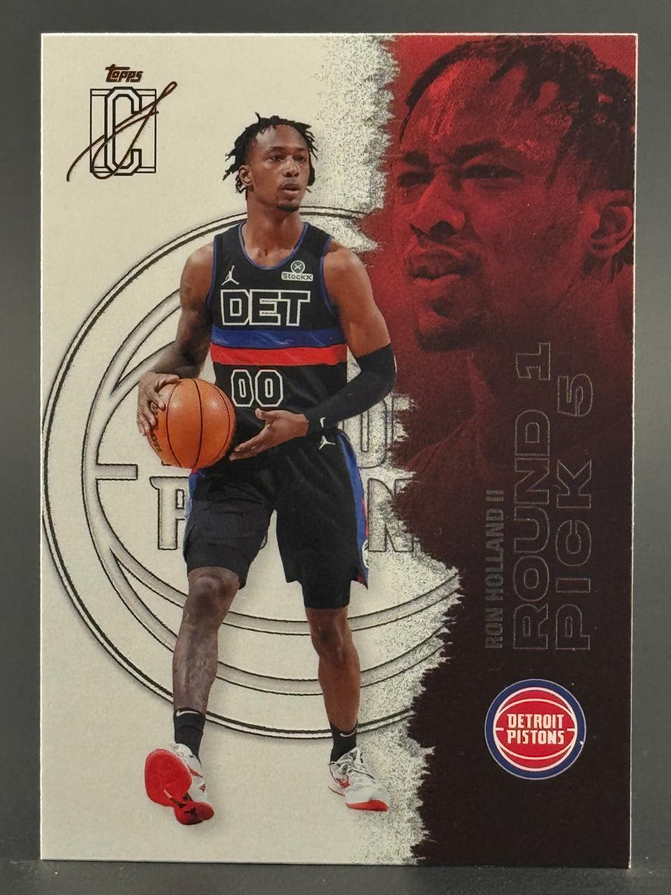 Ron Holland II Topps basketball card, Detroit Pistons uniform, holding a basketball.