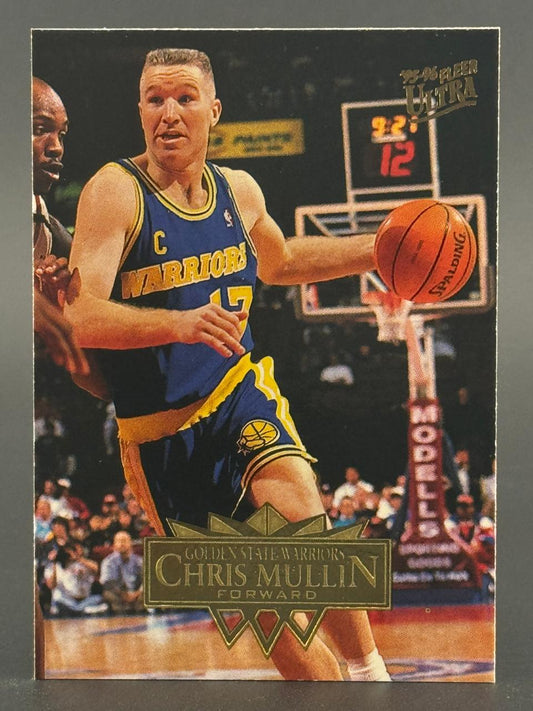 1995-96 Fleer Ultra Chris Mullin basketball card featuring him dribbling for the Golden State Warriors.