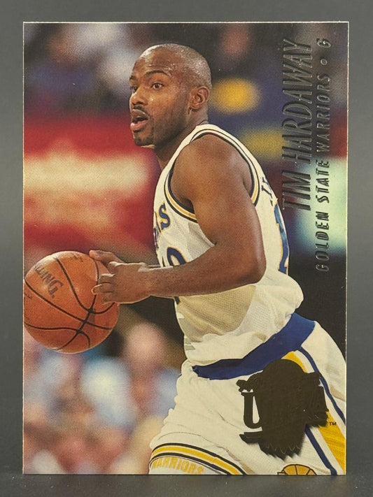 Trading card of Tim Hardaway in Golden State Warriors uniform holding a basketball.