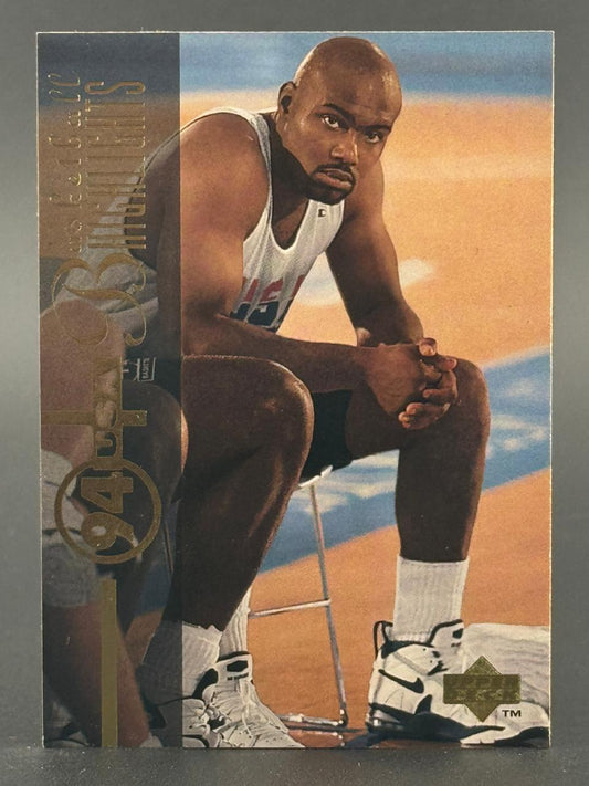 1994 USA Basketball Highlights trading card featuring a seated player in a white uniform with clasping hands.