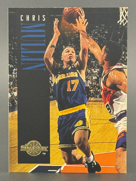 Trading card of Chris Mullin in a blue Warriors 17 jersey shooting a basketball under a SkyBox logo.