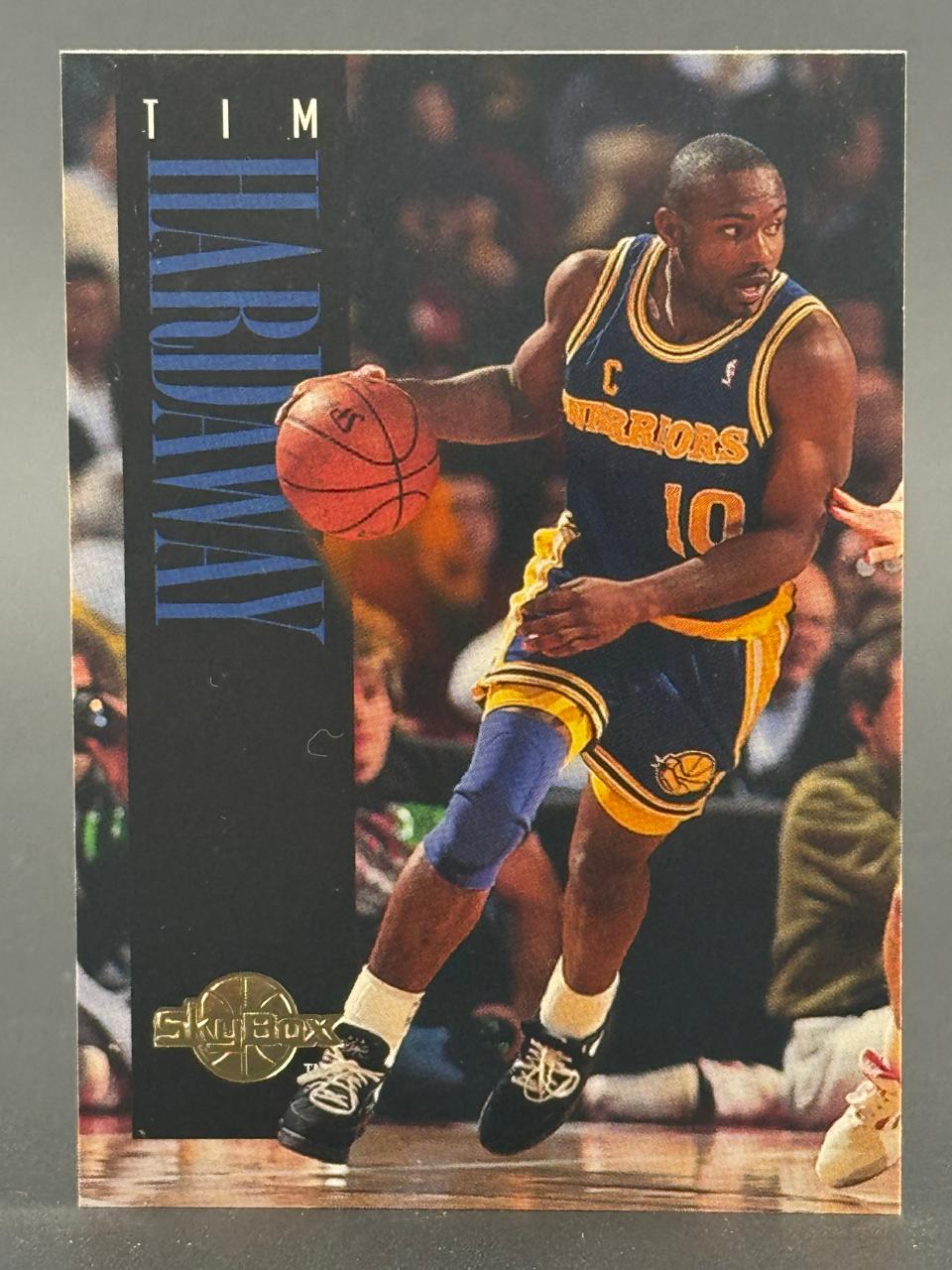 1990 SkyBox Tim Hardaway #182 basketball card featuring Hardaway dribbling in a Warriors uniform.