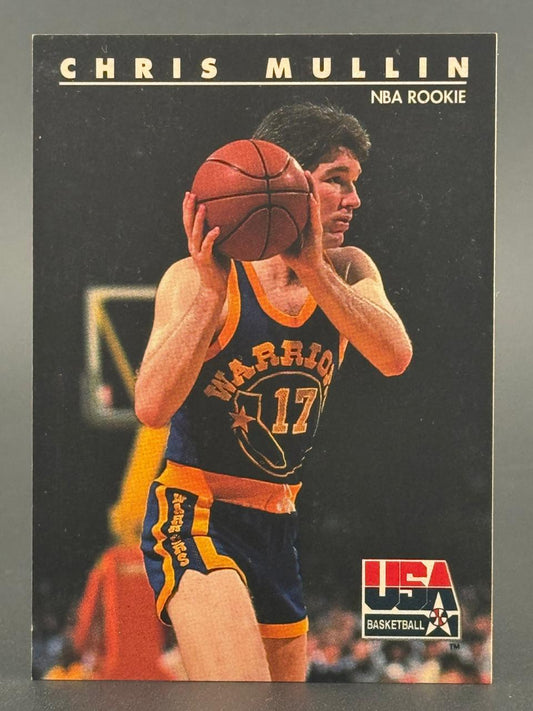 Chris Mullin 1986-87 Fleer NBA Rookie basketball card #113, showing him holding a ball in a Warriors uniform.
