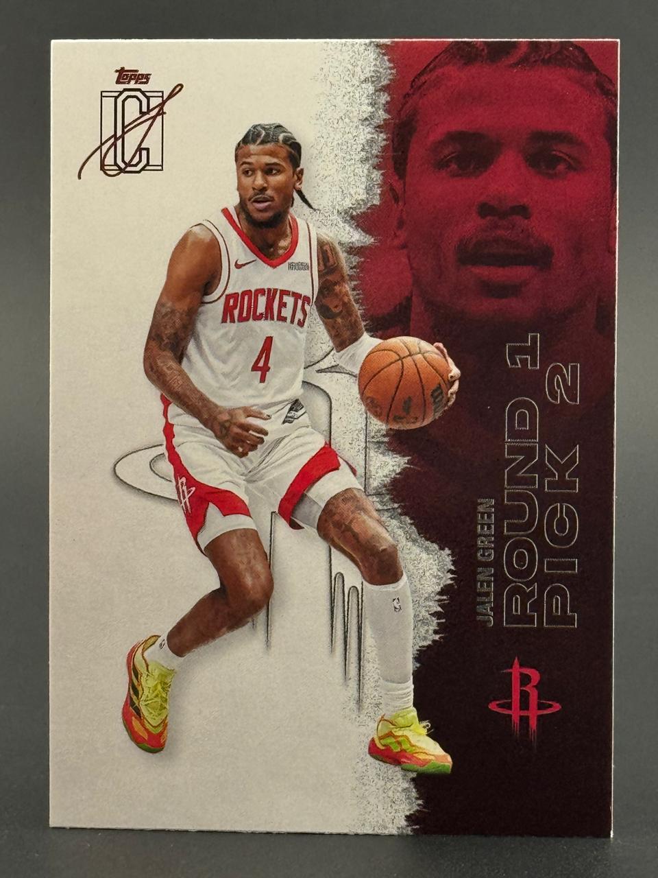 Jalen Green Topps basketball card featuring him in a Rockets uniform with a red and white design.