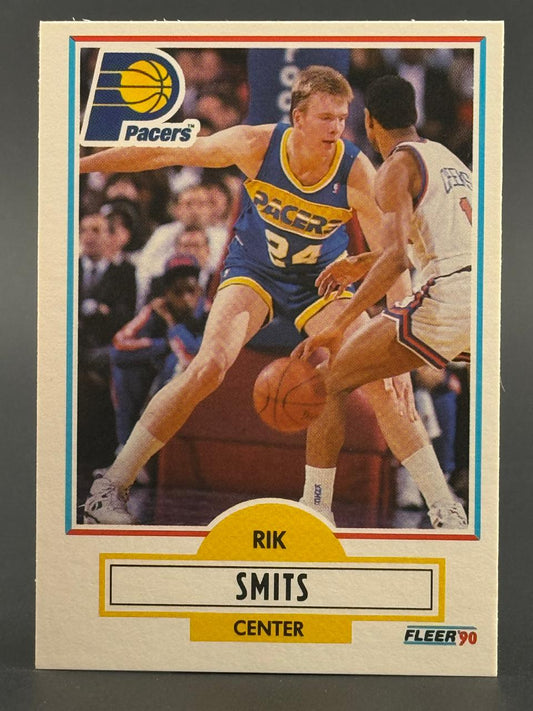 1990 Fleer Rik Smits basketball card showing Smits dribbling in a Pacers uniform.