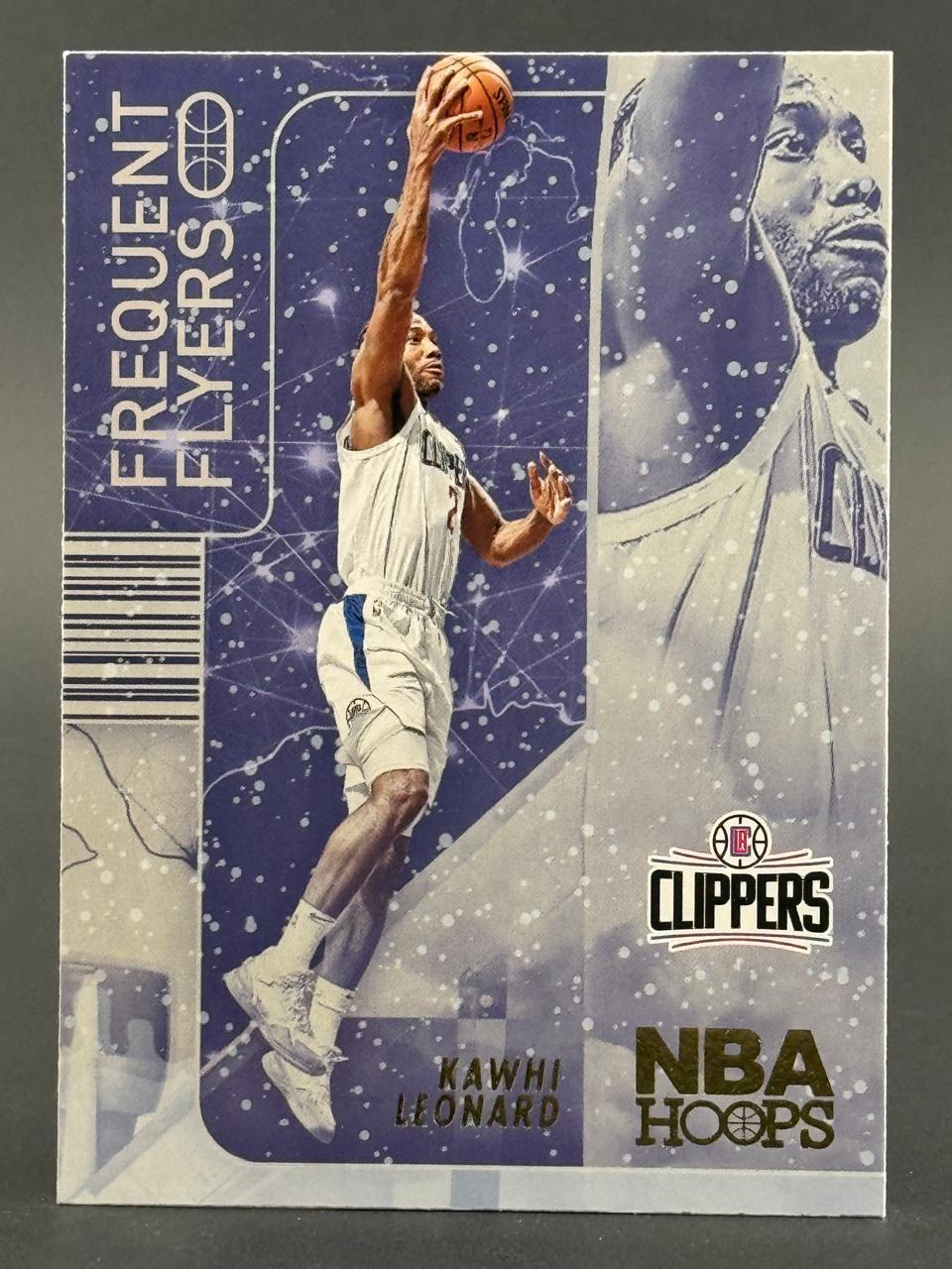Kawhi Leonard 2021-22 NBA Hoops Frequent Flyers trading card.