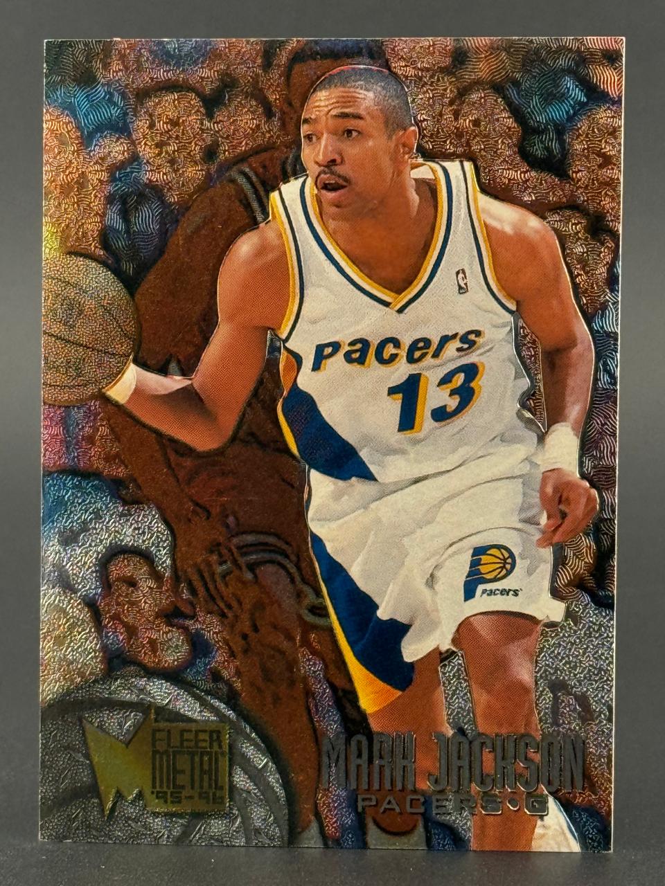 1995-96 Fleer Metal Mark Jackson basketball trading card featuring him dribbling in a Pacers uniform.
