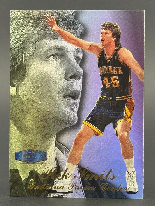 Rik Smits 1996-97 Flair Showcase basketball card, featuring a large portrait and full-body action shot.