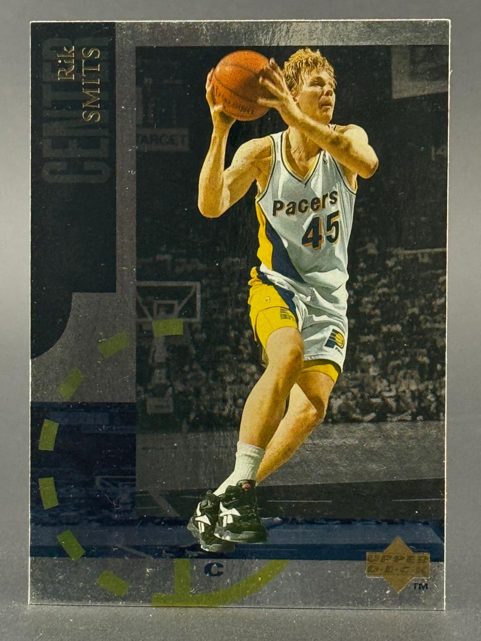 1990s Upper Deck Rik Smits basketball card, #45, showing him holding a basketball in a Pacers uniform.