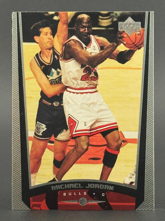 Michael Jordan 1997-98 Upper Deck Basketball Card, featuring Jordan in his Bulls uniform guarding an opponent.