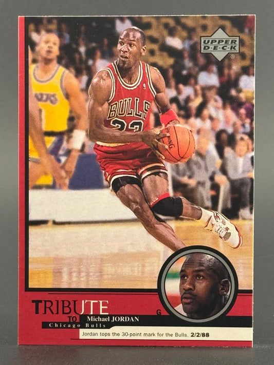 Michael Jordan 1990s Upper Deck basketball card, Tribute to Michael Jordan series, holding basketball on court.
