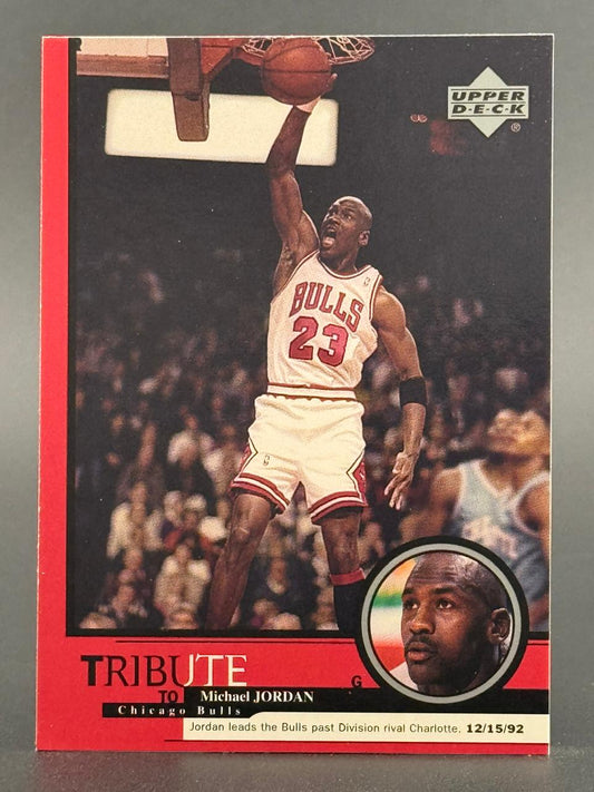 1992 Upper Deck Michael Jordan Tribute basketball card #G1 featuring Jordan dunking in a Bulls uniform.