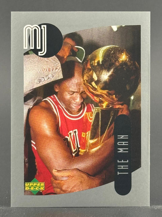 1993 Upper Deck Michael Jordan "The Man" trading card, featuring Jordan crying while hugging a trophy.