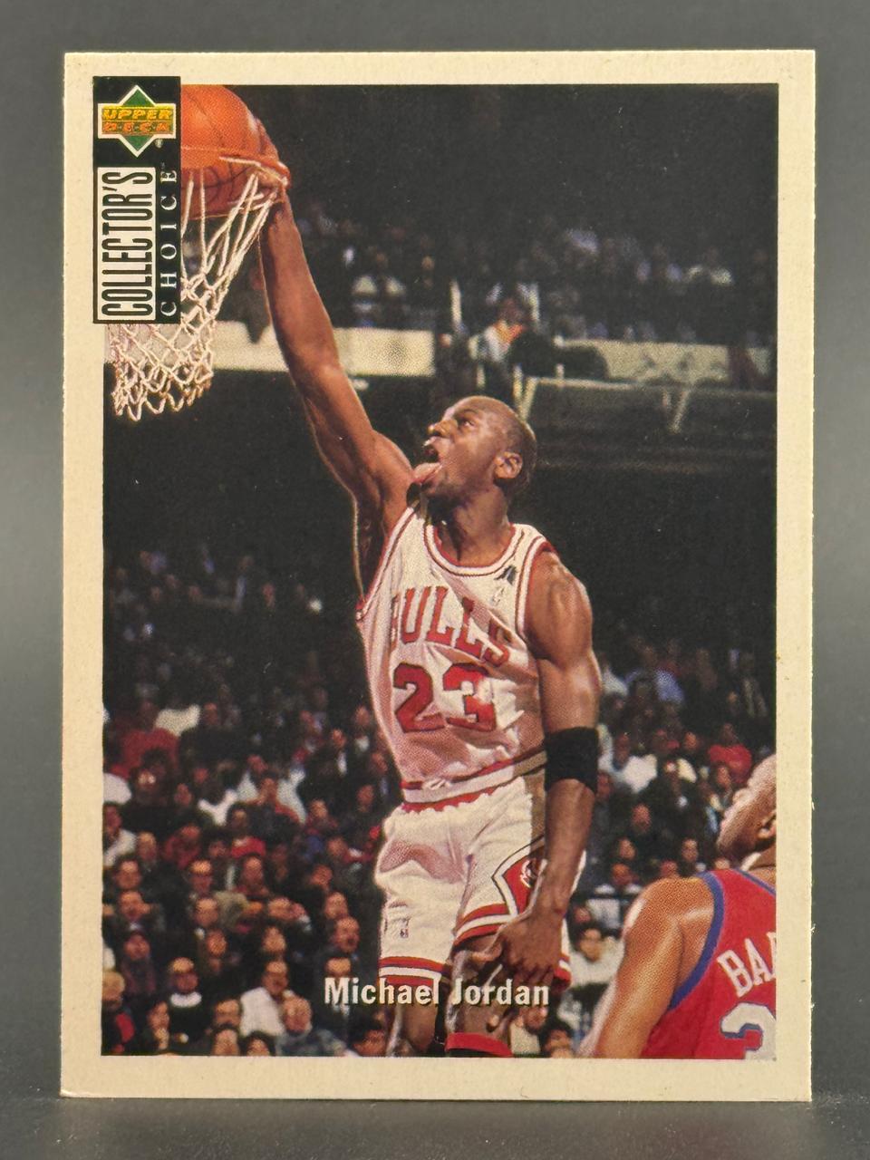 Michael Jordan basketball card, Upper Deck Collector's Choice, showing him dunking.
