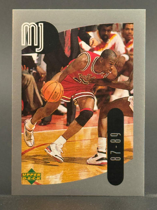 Michael Jordan 1991 Upper Deck basketball card featuring an action shot with text "mj" and "87-89".