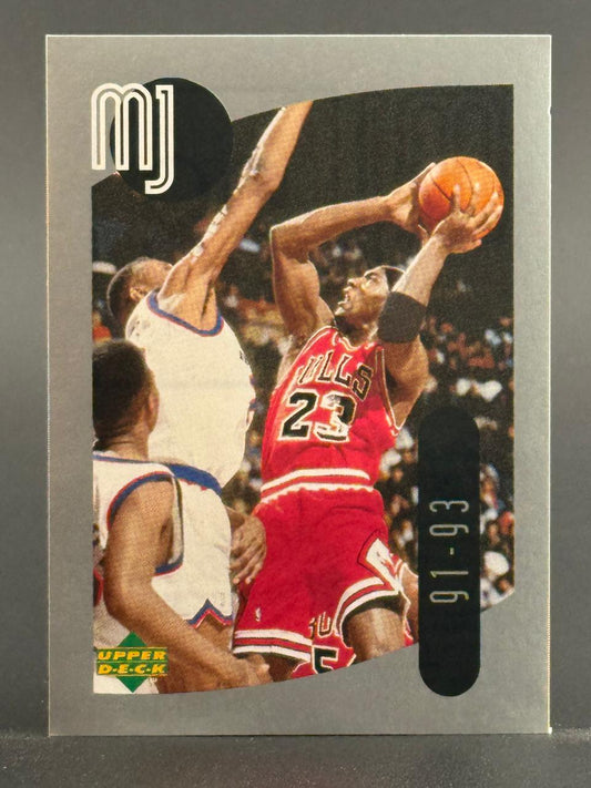 1993 Upper Deck Michael Jordan trading card, #91-93, showing Jordan in a red Bulls uniform holding a basketball.