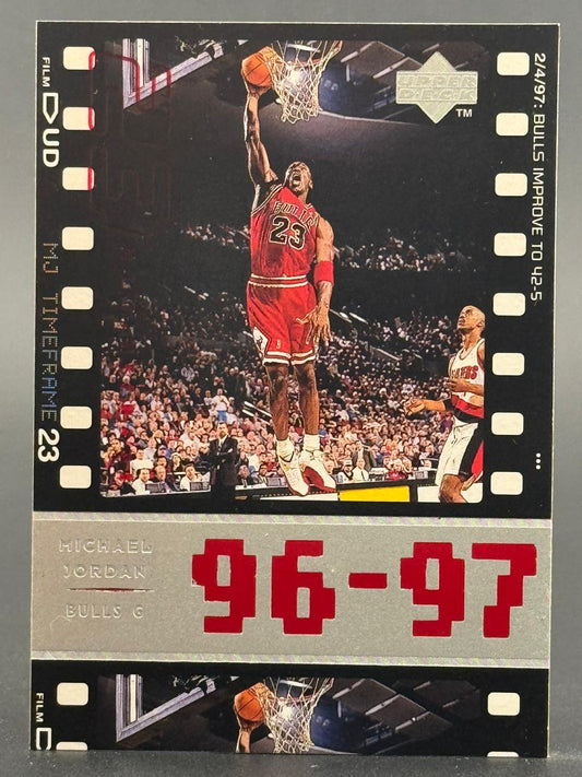 1996-97 Upper Deck Michael Jordan basketball card, MJ Timeframe #23, showing Jordan dunking.