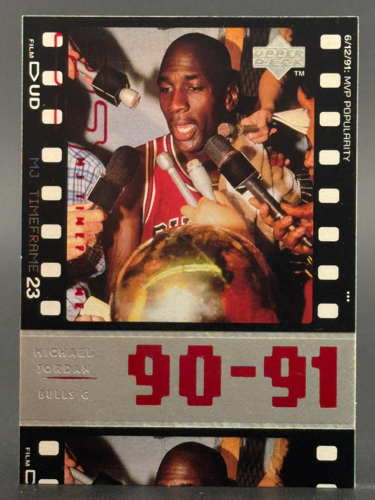 1990-91 Upper Deck Michael Jordan trading card, #23, featuring Jordan surrounded by microphones.