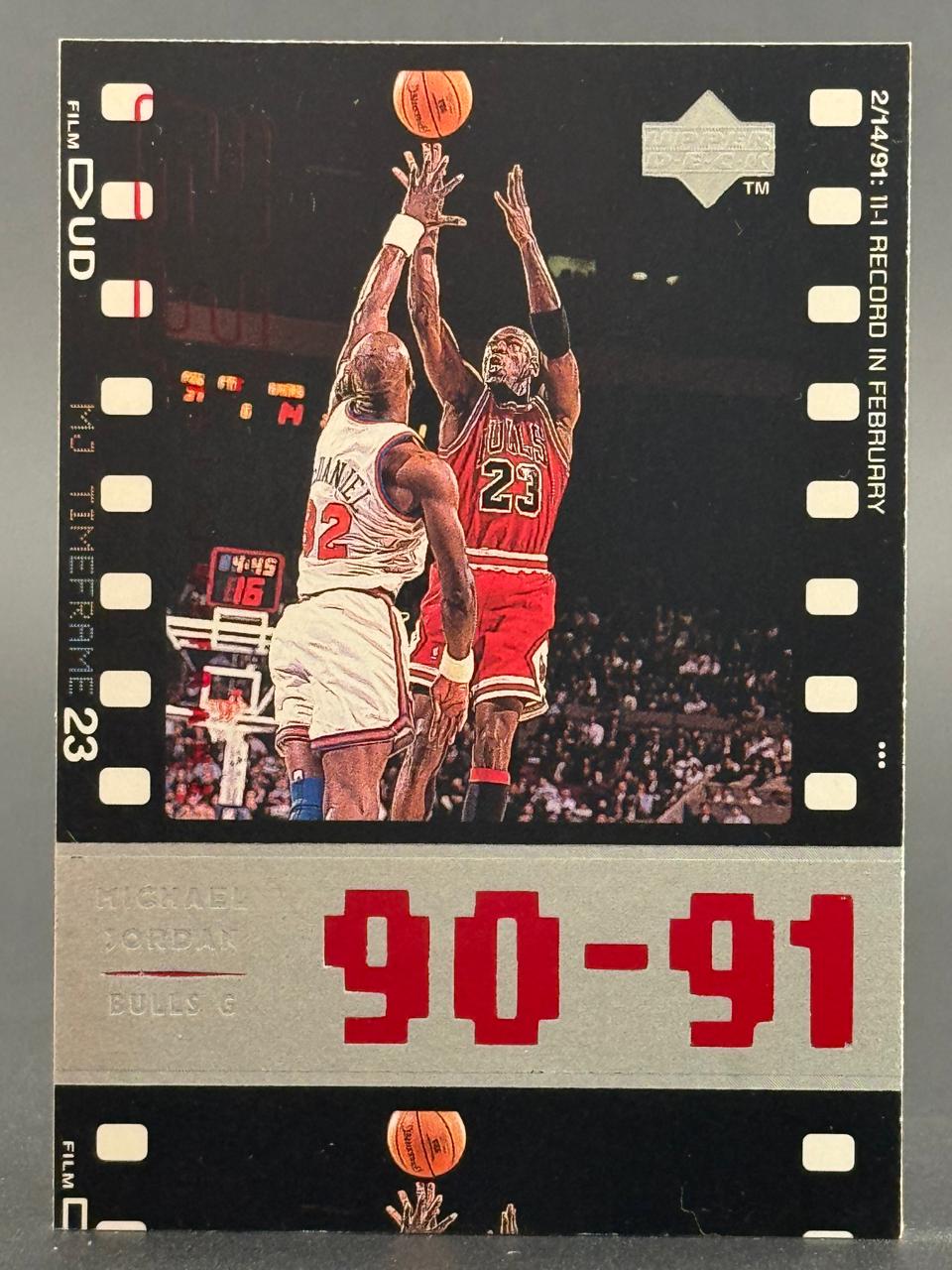 1991-92 Upper Deck Michael Jordan trading card showing him shooting over an opponent.